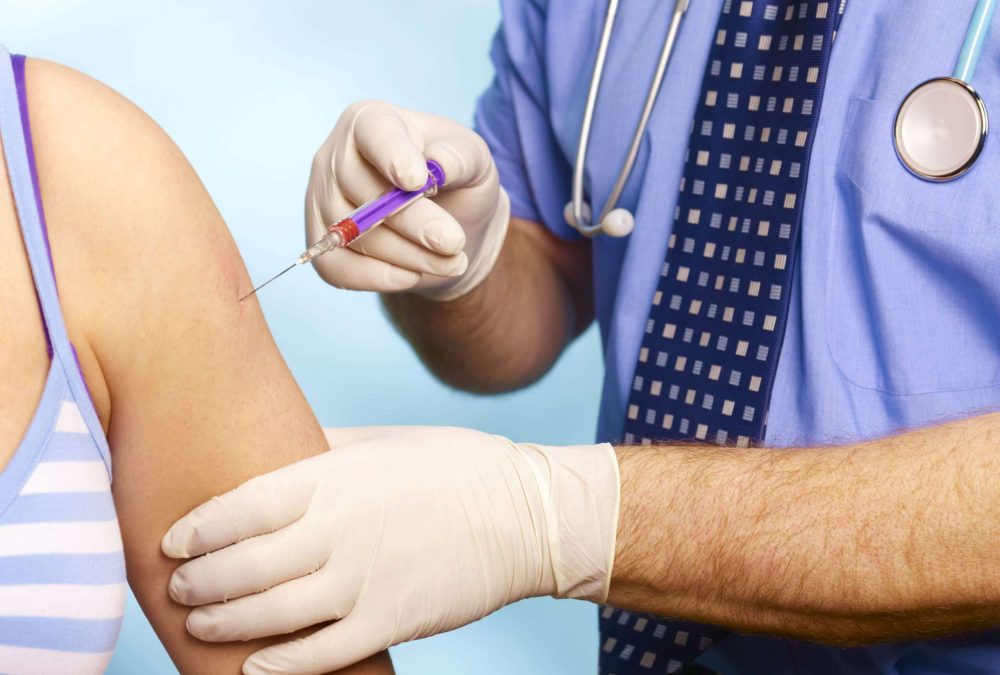 teenager-receiving-contraceptive-injection--86013044-59d4feae0d327a00119677e4